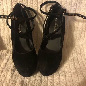 Black Mary Jane style platform pumps